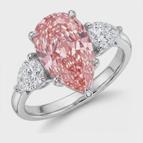 2.5 Carat Pear Pink Lab Grown Diamond and White Diamond Three Stone Ring 14K White Gold