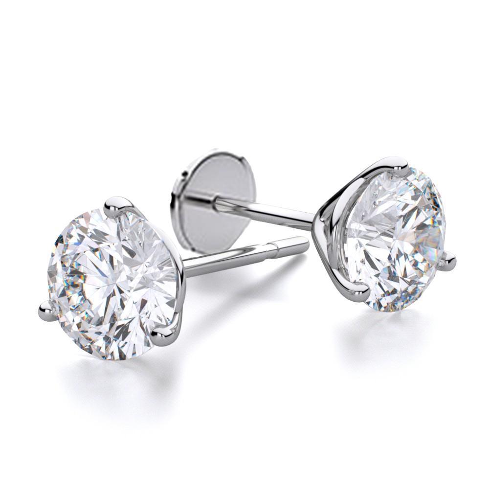 Lady’s Brilliant  Three Prong Set Round Cut Diamonds Stud Earrings 