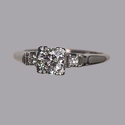 Round Three Stone Old Miner Diamond Ring