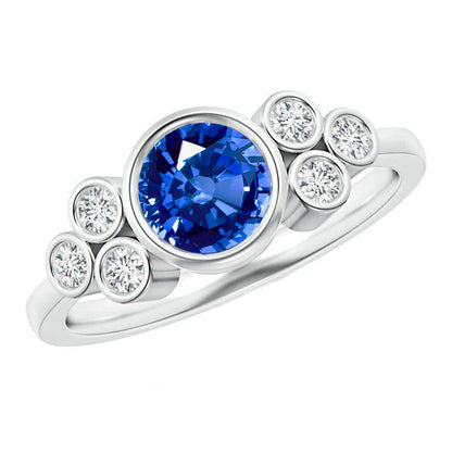  Elegant Woman's Bezel Set Ceylon Sapphire And Diamond Ring White Gold