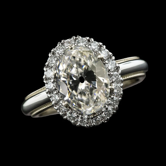 Halo Oval Old Miner & Round Diamond Ring
