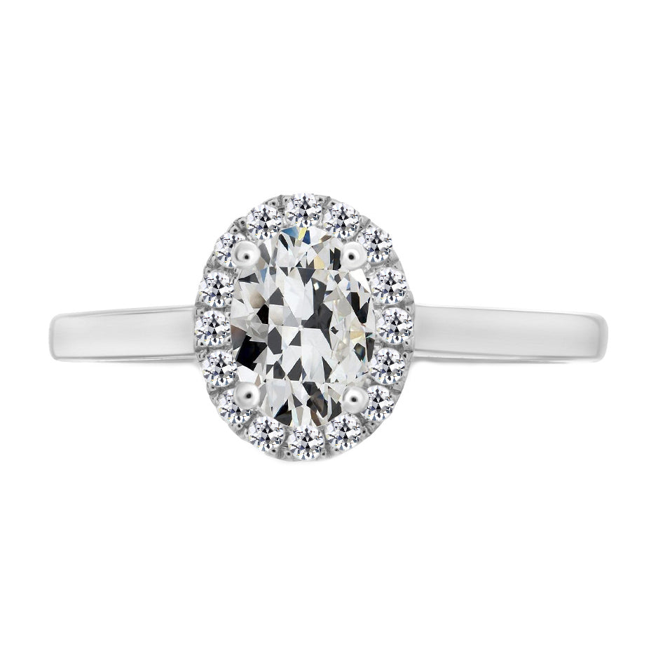 Oval And Round Old Cut 4 Carats Diamond Halo Ring