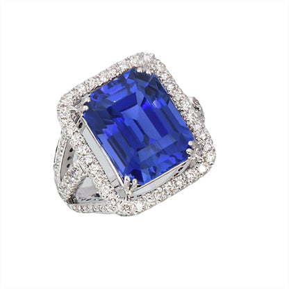 Ladies Sparkling Blue Sapphire Diamond Halo Engagement Ring