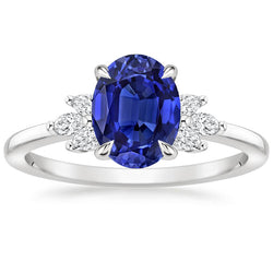 Oval Solitaire Blue Sapphire Ring With Pear Side Stones 4.50 Carats