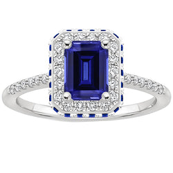 Diamond Halo Ring With Blue Sapphires on Side Emerald 4.25 Carats