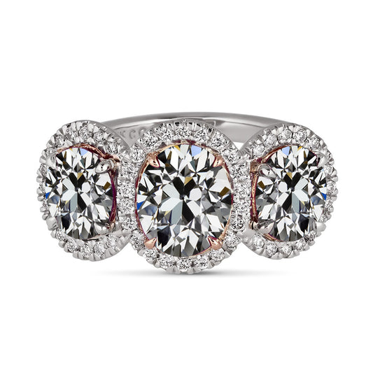 Two Tone Oval Old Mine Cut Diamond Halo Ring