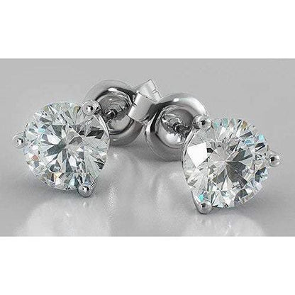   Lady’s White Gold Round Anniversary Stud Earrings